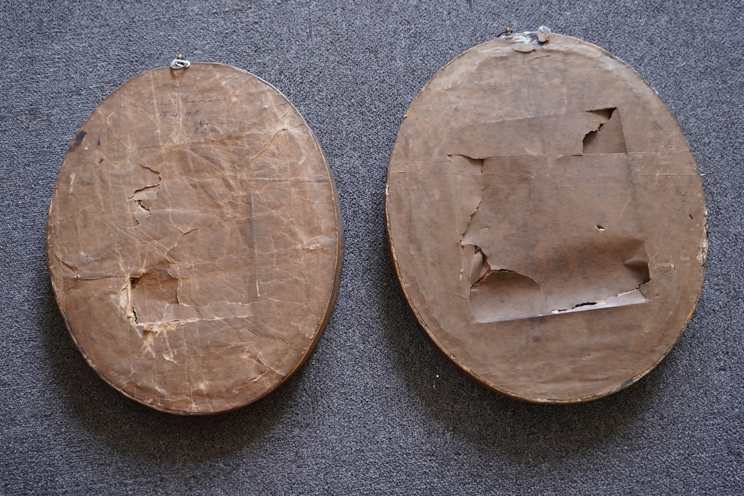 A pair of unusual early 19th century oval silk Chenille embroideries, one depicting a seated lady surrounded by a lion and donkey, the other depicting a seated shepherdess under tree with two sheep. Both have water colou